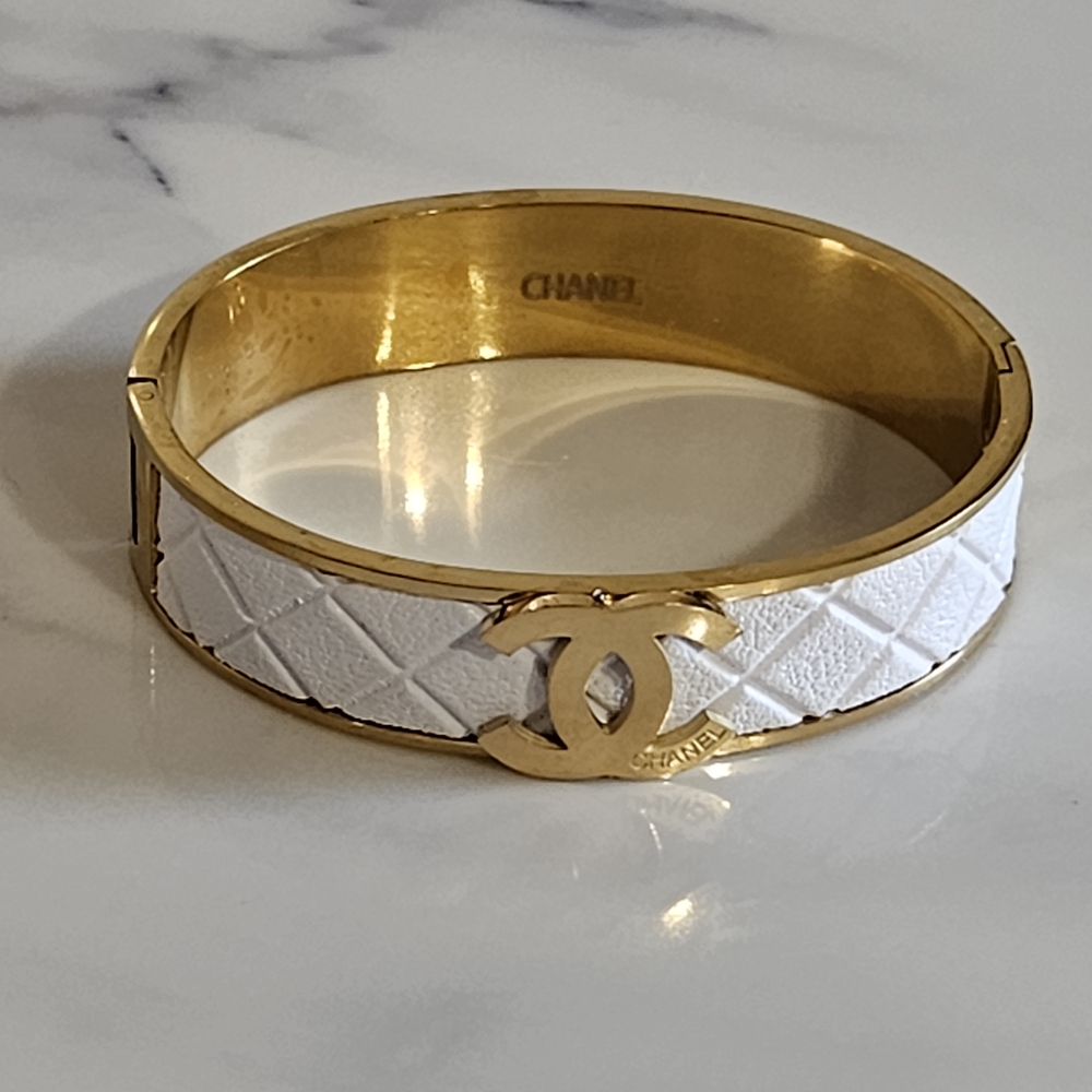 New - CC Inspired Goldtone and White Quilted Band Design Bracelet